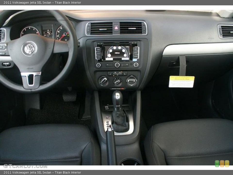 Titan Black Interior Dashboard for the 2011 Volkswagen Jetta SEL Sedan #38465649