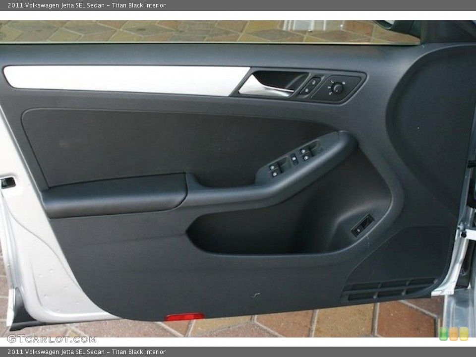 Titan Black Interior Door Panel for the 2011 Volkswagen Jetta SEL Sedan #38465733