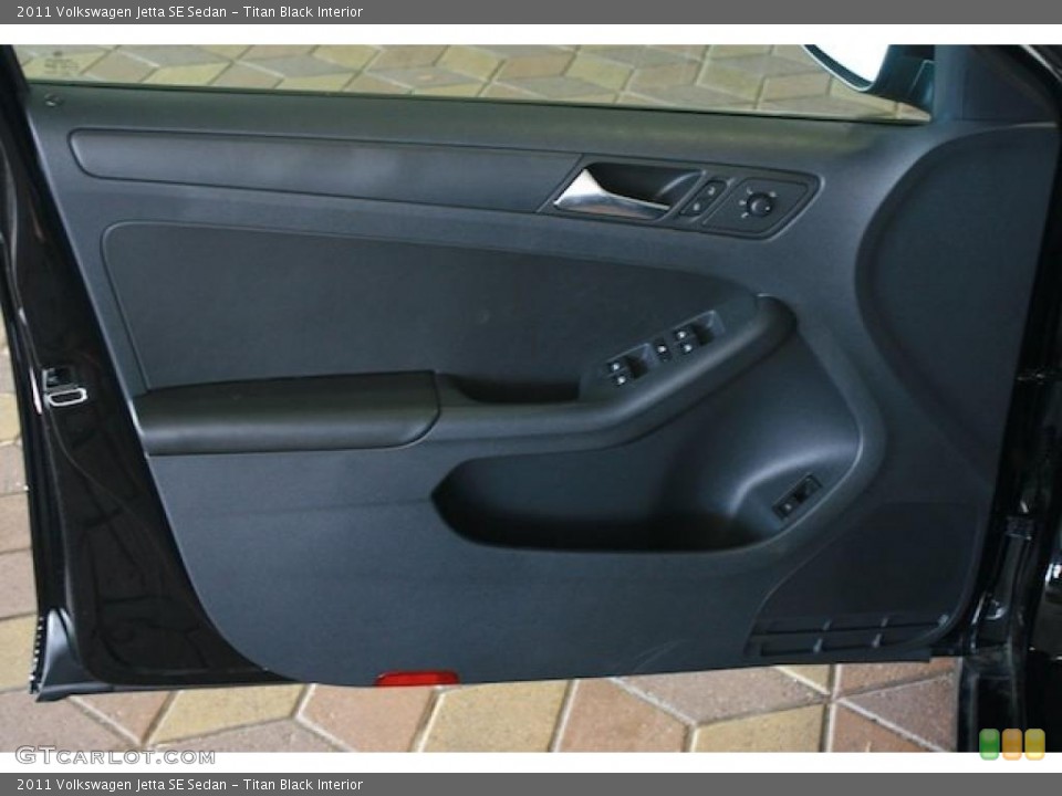Titan Black Interior Door Panel for the 2011 Volkswagen Jetta SE Sedan #38466033