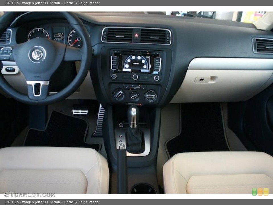 Cornsilk Beige Interior Dashboard for the 2011 Volkswagen Jetta SEL Sedan #38467685
