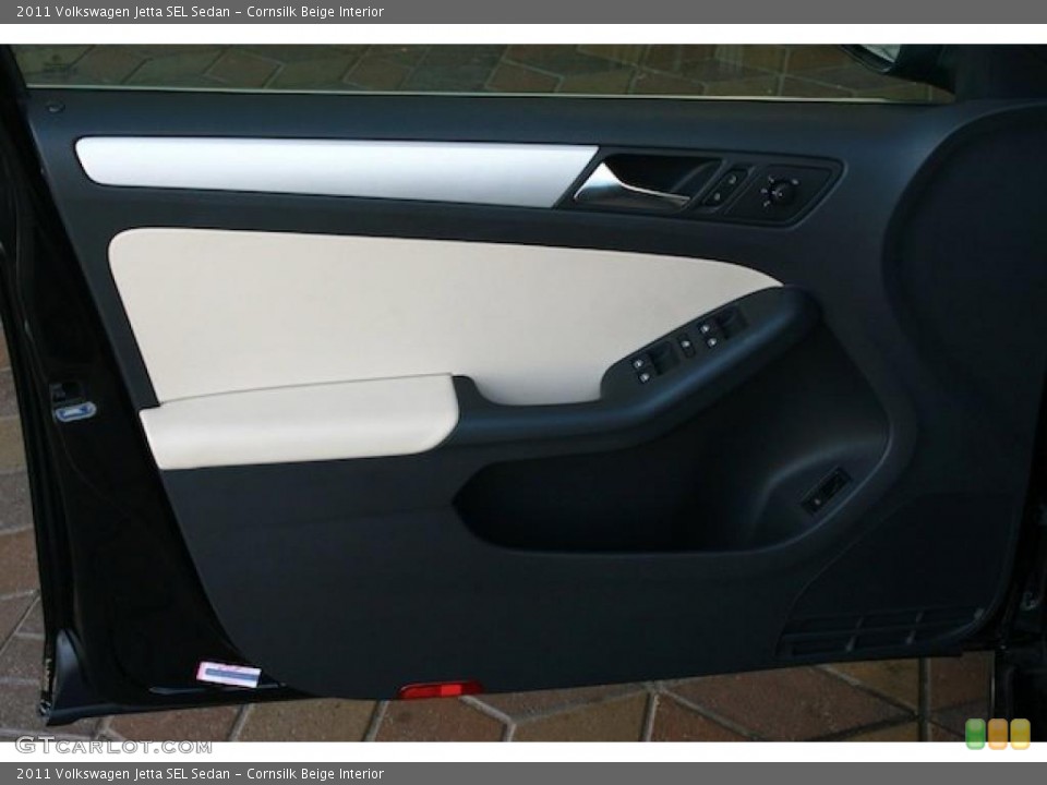 Cornsilk Beige Interior Door Panel for the 2011 Volkswagen Jetta SEL Sedan #38467757