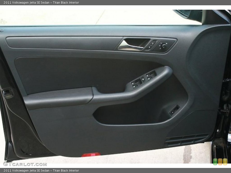 Titan Black Interior Door Panel for the 2011 Volkswagen Jetta SE Sedan #38468185
