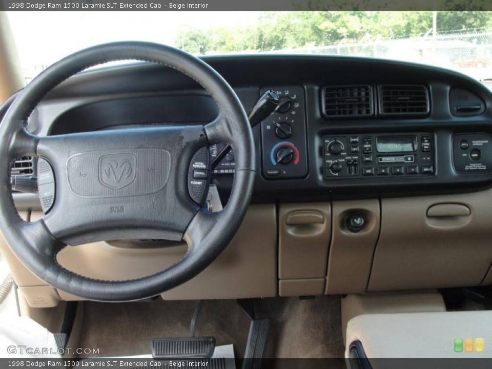 Beige Interior Dashboard for the 1998 Dodge Ram 1500 Laramie SLT Extended Cab #38475911