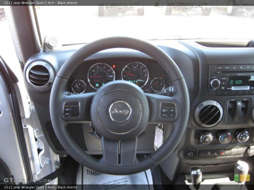 Black Interior Steering Wheel for the 2011 Jeep Wrangler Sport S 4x4 #38501179