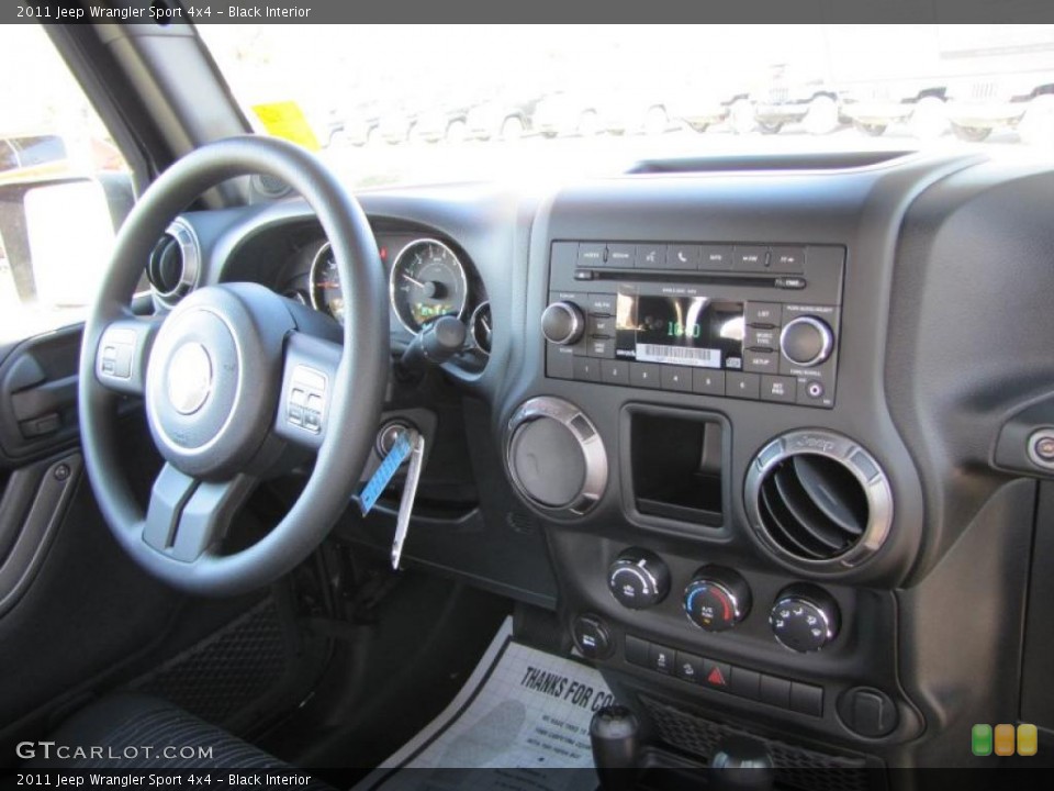 Black Interior Dashboard for the 2011 Jeep Wrangler Sport 4x4 #38515359