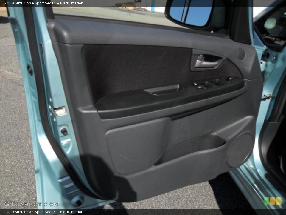 Black Interior Door Panel for the 2009 Suzuki SX4 Sport Sedan #38518007