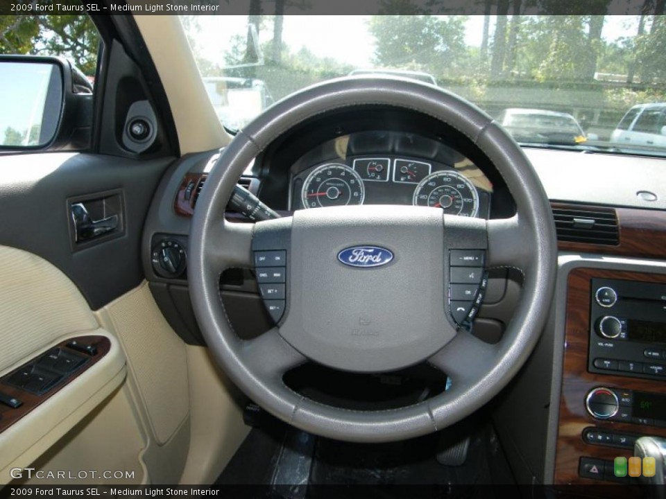 Medium Light Stone Interior Steering Wheel for the 2009 Ford Taurus SEL #38522303