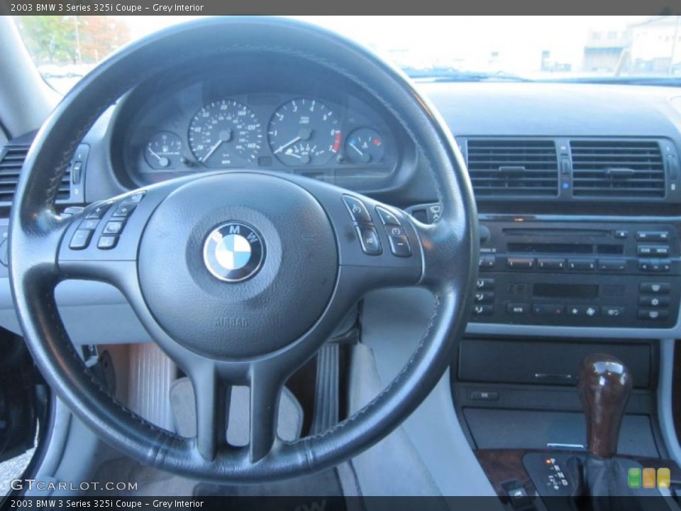 Grey Interior Dashboard for the 2003 BMW 3 Series 325i Coupe #38537391