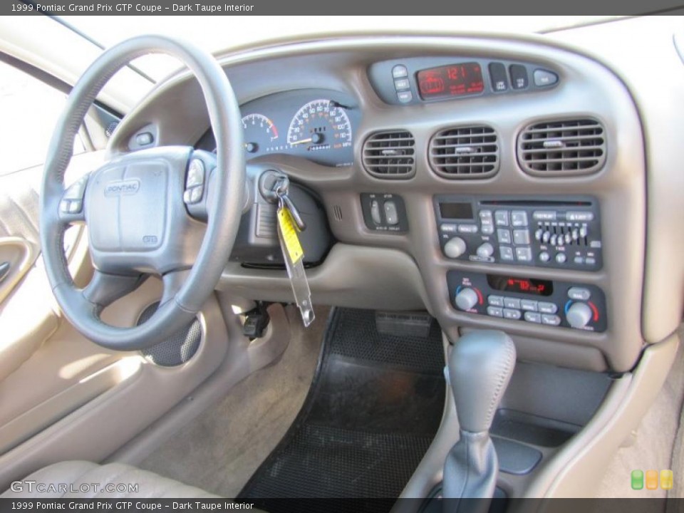 Dark Taupe Interior Dashboard for the 1999 Pontiac Grand Prix GTP Coupe #38541691
