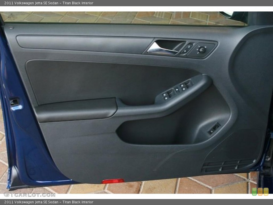 Titan Black Interior Door Panel for the 2011 Volkswagen Jetta SE Sedan #38543423