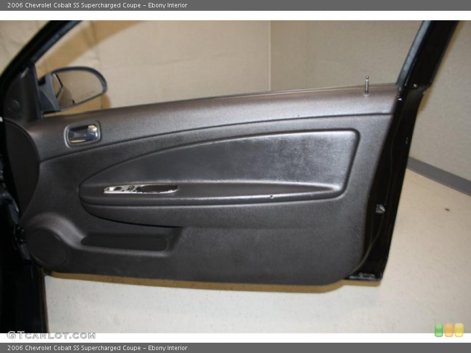 Ebony Interior Door Panel for the 2006 Chevrolet Cobalt SS Supercharged Coupe #38543439