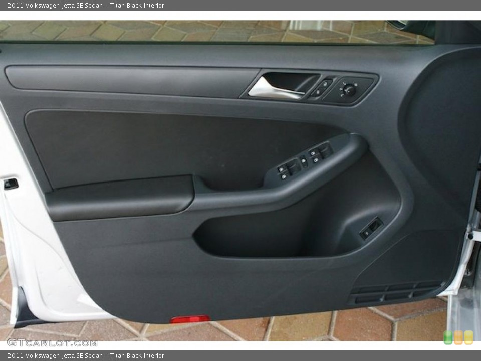 Titan Black Interior Door Panel for the 2011 Volkswagen Jetta SE Sedan #38544511