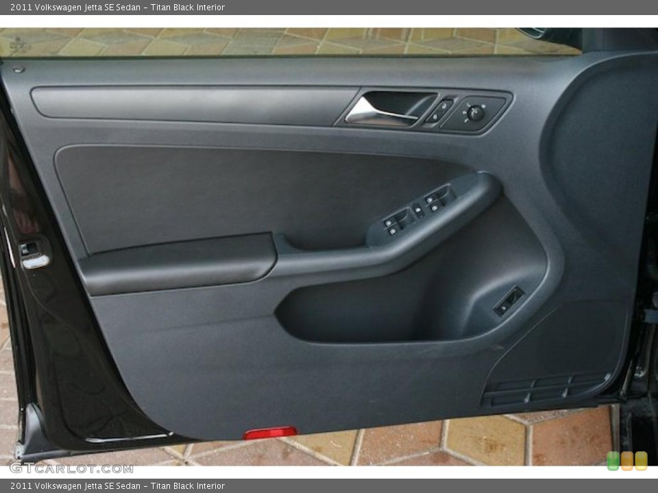 Titan Black Interior Door Panel for the 2011 Volkswagen Jetta SE Sedan #38544707