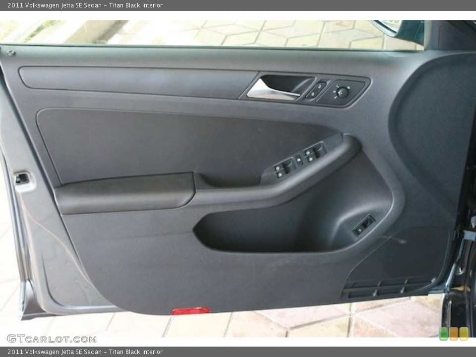 Titan Black Interior Door Panel for the 2011 Volkswagen Jetta SE Sedan #38545343