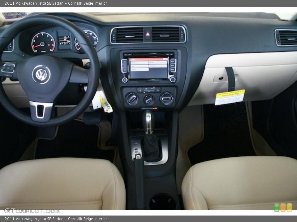 Cornsilk Beige Interior Dashboard for the 2011 Volkswagen Jetta SE Sedan #38545487