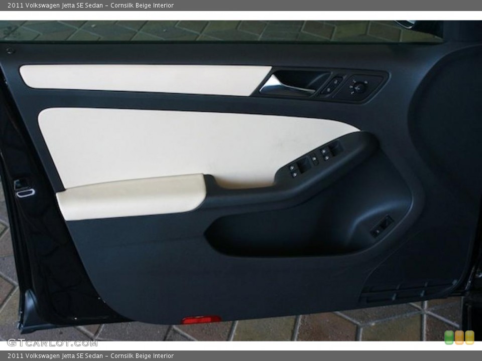 Cornsilk Beige Interior Door Panel for the 2011 Volkswagen Jetta SE Sedan #38545547