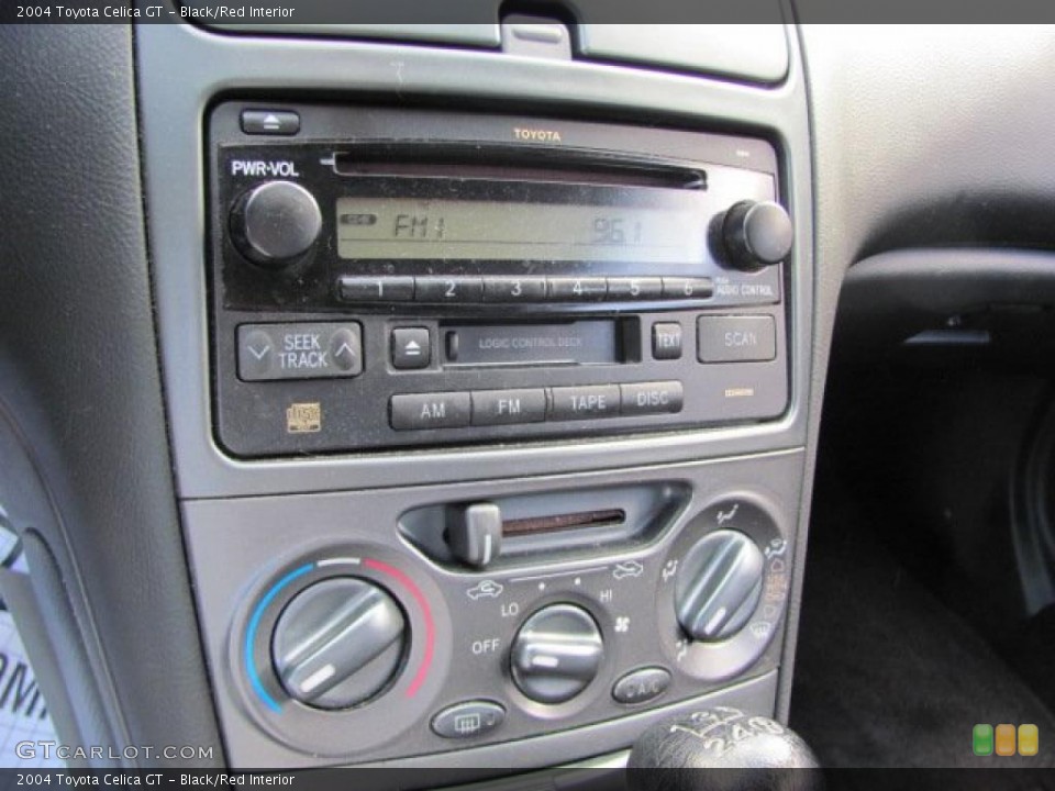Black/Red Interior Controls for the 2004 Toyota Celica GT #38556129