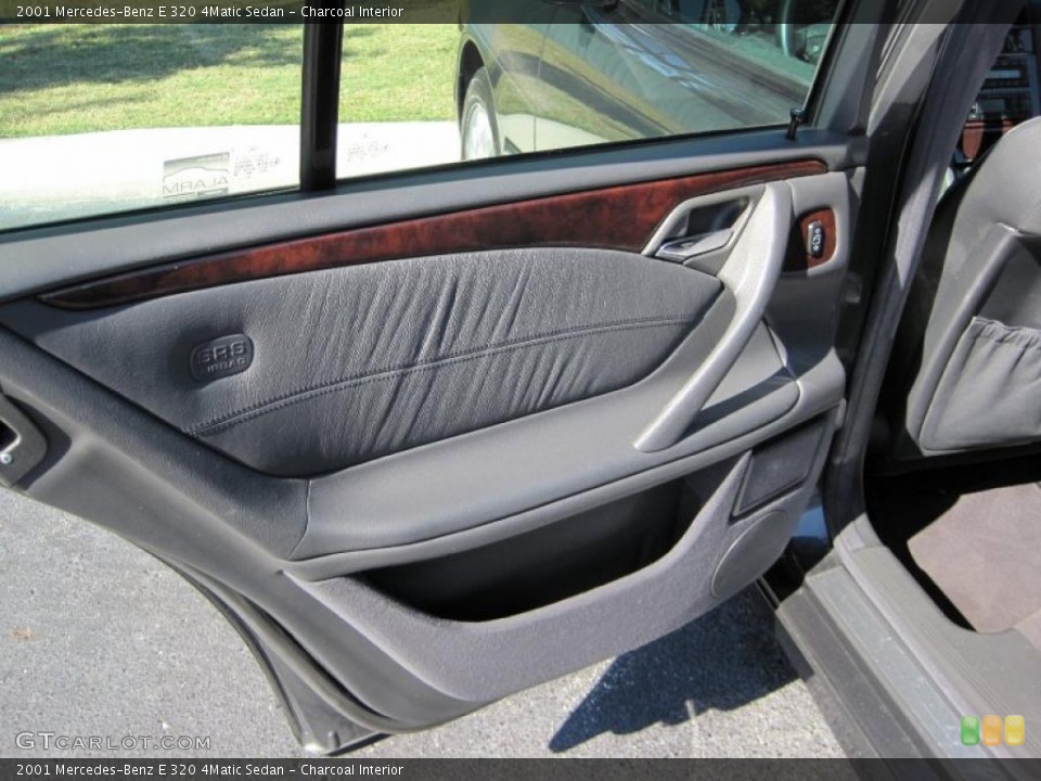 Charcoal Interior Door Panel for the 2001 Mercedes-Benz E 320 4Matic Sedan #38557409