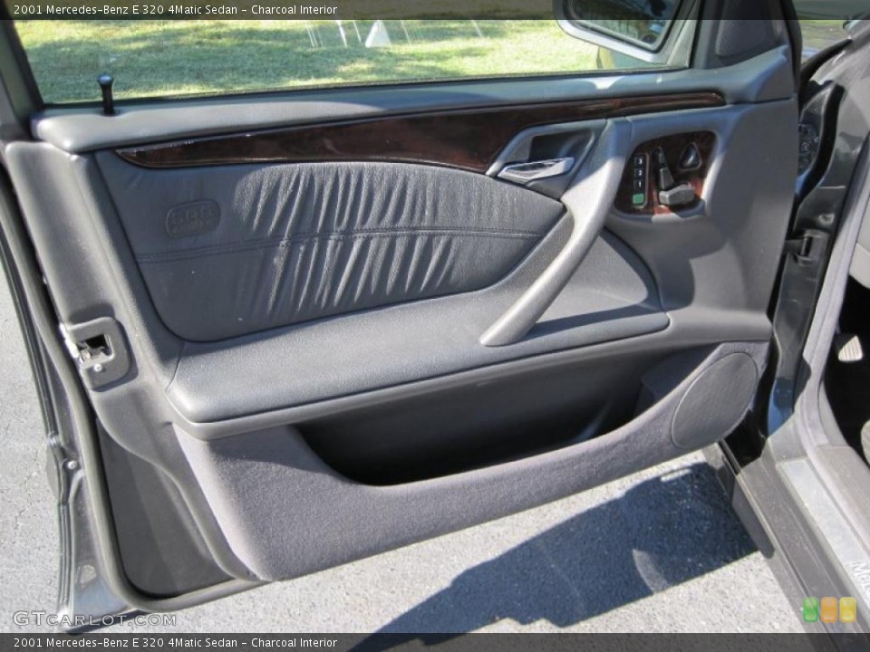Charcoal Interior Door Panel for the 2001 Mercedes-Benz E 320 4Matic Sedan #38557461