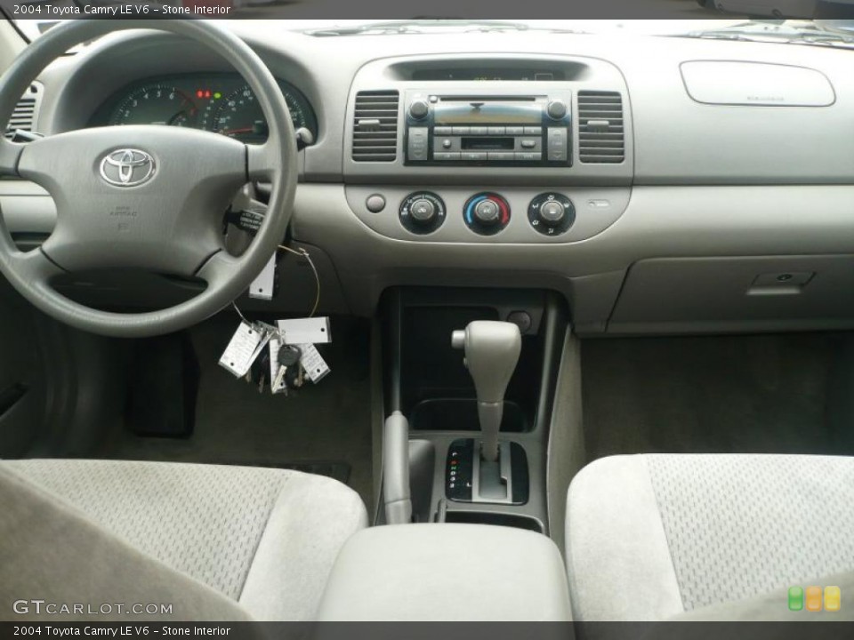 Stone Interior Dashboard for the 2004 Toyota Camry LE V6 #38571508