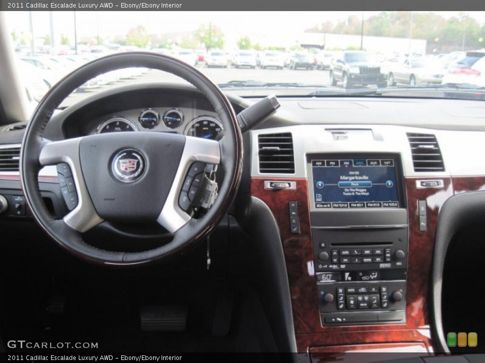 Ebony/Ebony Interior Dashboard for the 2011 Cadillac Escalade Luxury AWD #38573776