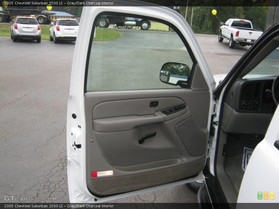 Gray/Dark Charcoal Interior Door Panel for the 2005 Chevrolet Suburban 1500 LS #38577180