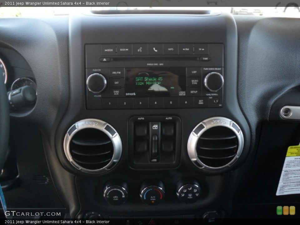 Black Interior Controls for the 2011 Jeep Wrangler Unlimited Sahara 4x4 #38587641