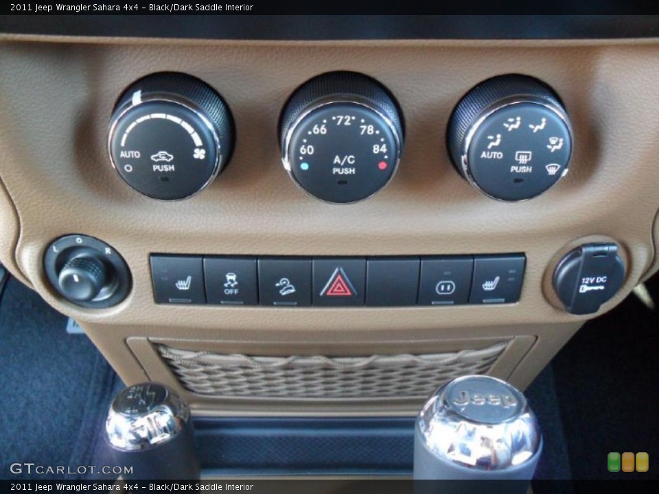 Black/Dark Saddle Interior Controls for the 2011 Jeep Wrangler Sahara 4x4 #38589057