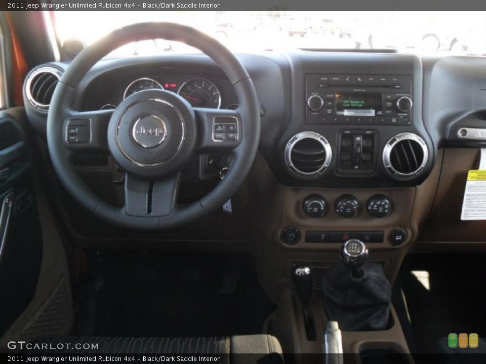 Black/Dark Saddle Interior Dashboard for the 2011 Jeep Wrangler Unlimited Rubicon 4x4 #38589433
