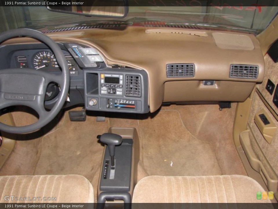 Beige Interior Photo for the 1991 Pontiac Sunbird LE Coupe #38603929