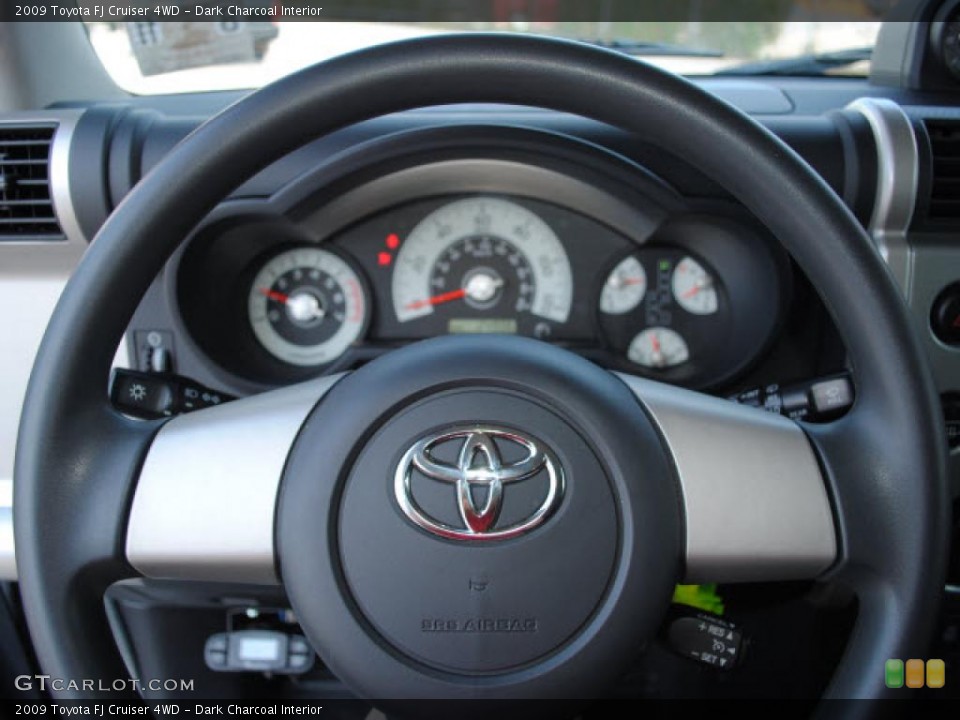 Dark Charcoal Interior Steering Wheel for the 2009 Toyota FJ Cruiser 4WD #38617802