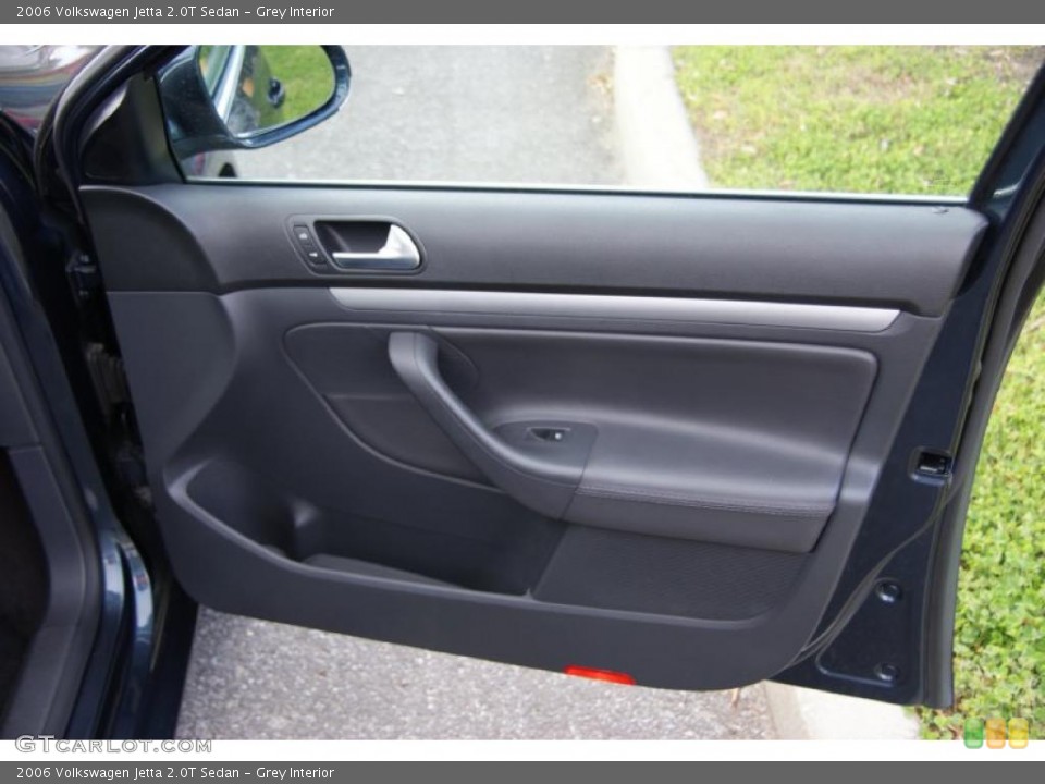 Grey Interior Door Panel for the 2006 Volkswagen Jetta 2.0T Sedan #38619778