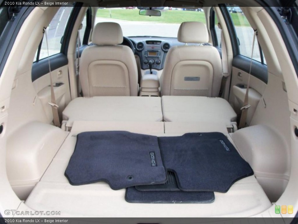 Beige Interior Trunk for the 2010 Kia Rondo LX #38629250