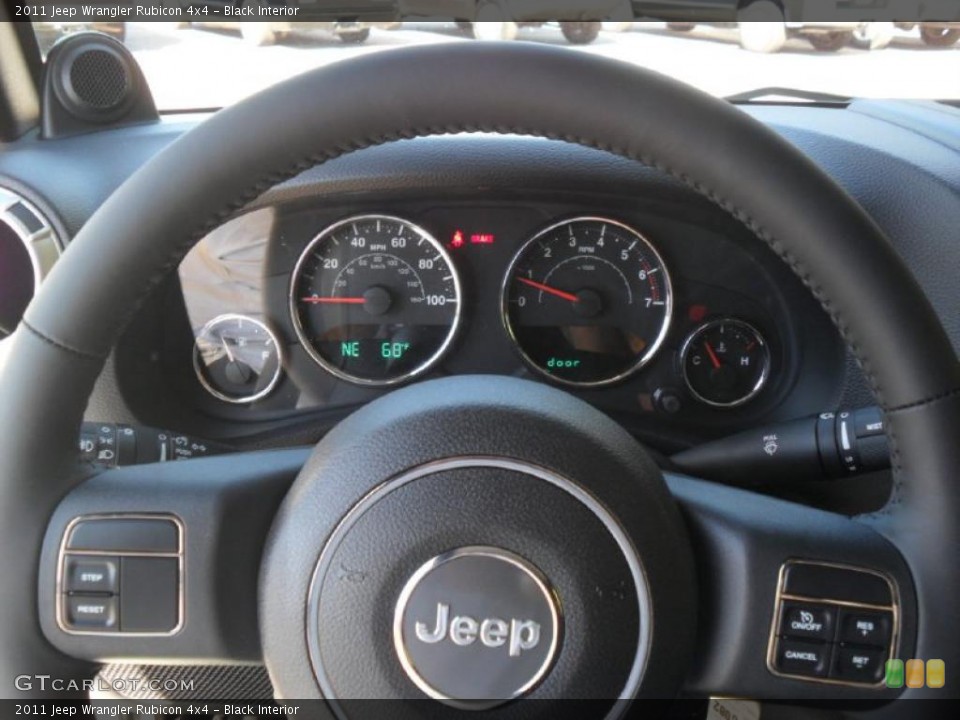 Black Interior Steering Wheel for the 2011 Jeep Wrangler Rubicon 4x4 #38632654