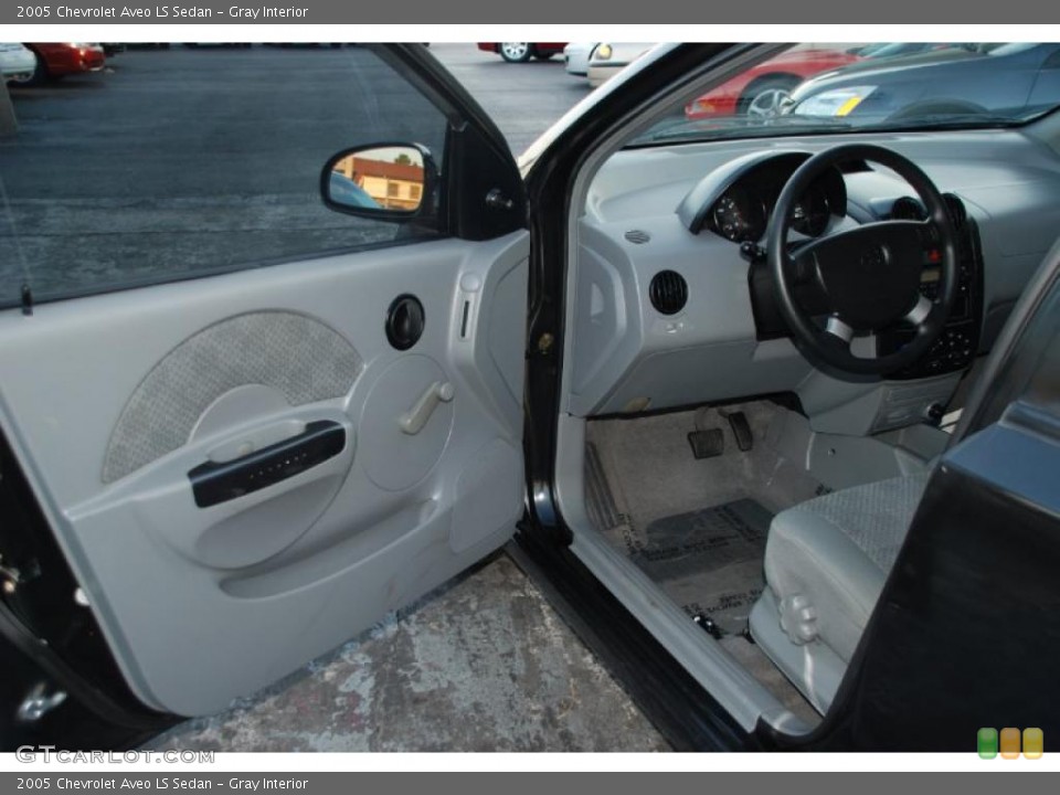 Gray Interior Door Panel for the 2005 Chevrolet Aveo LS Sedan #38641618