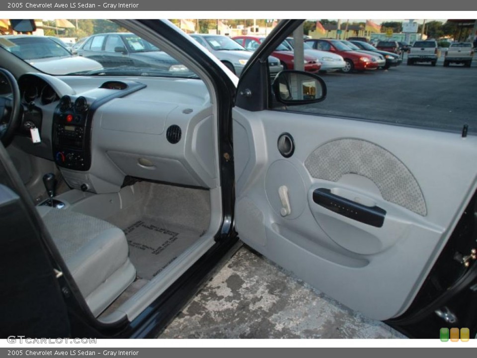 Gray Interior Door Panel for the 2005 Chevrolet Aveo LS Sedan #38641634