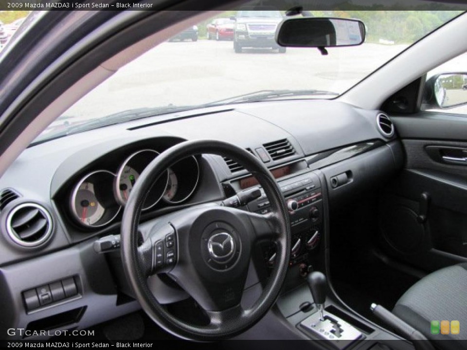 Black Interior Dashboard for the 2009 Mazda MAZDA3 i Sport Sedan #38646714