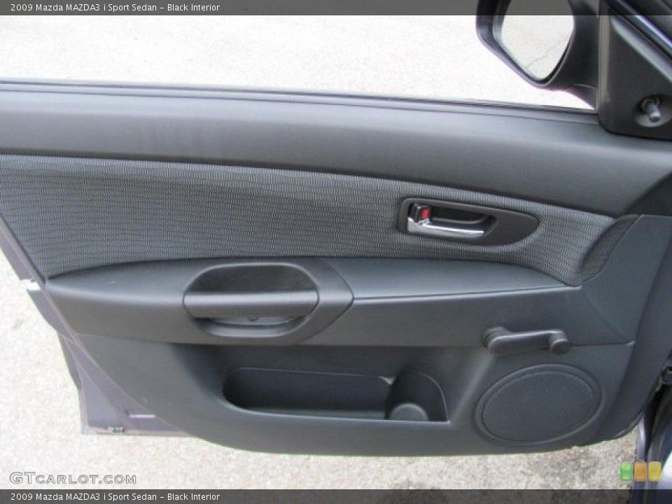 Black Interior Door Panel for the 2009 Mazda MAZDA3 i Sport Sedan #38646730