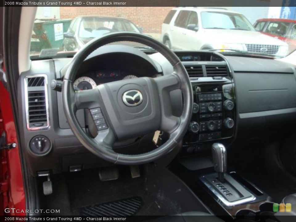 Charcoal Black Interior Dashboard for the 2008 Mazda Tribute s Grand Touring 4WD #38647262