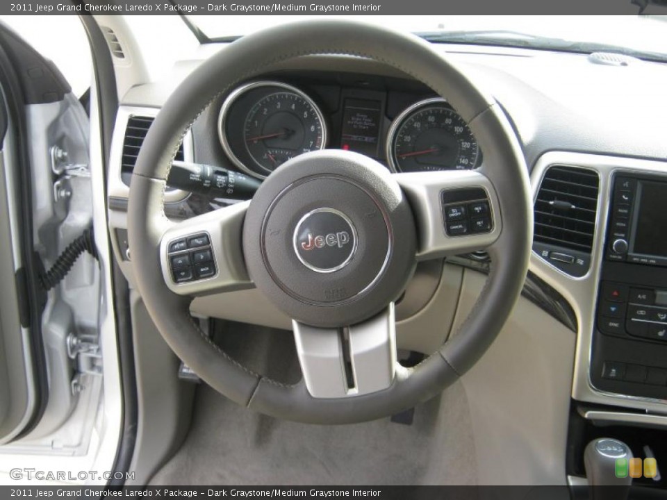 Dark Graystone/Medium Graystone Interior Steering Wheel for the 2011 Jeep Grand Cherokee Laredo X Package #38651454