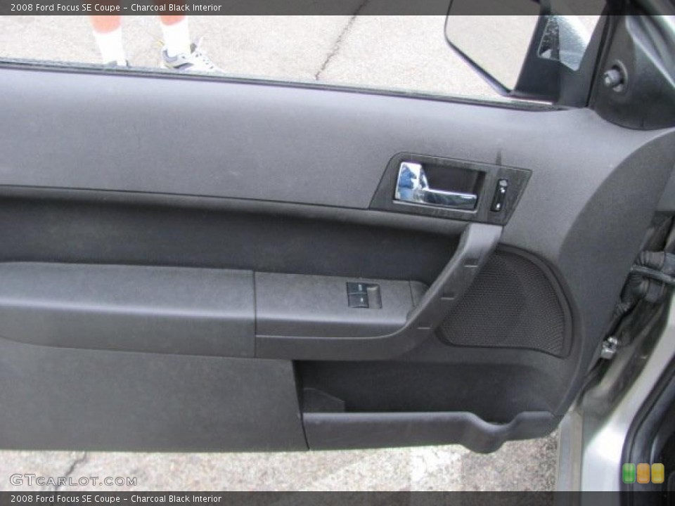Charcoal Black Interior Door Panel for the 2008 Ford Focus SE Coupe #38656358