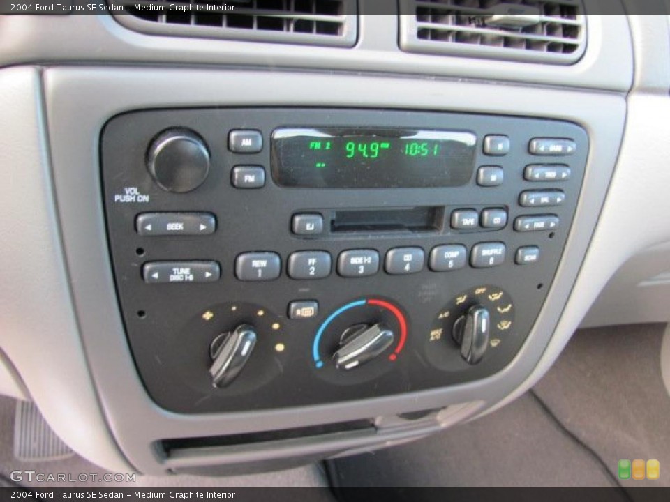 Medium Graphite Interior Controls for the 2004 Ford Taurus SE Sedan #38668942