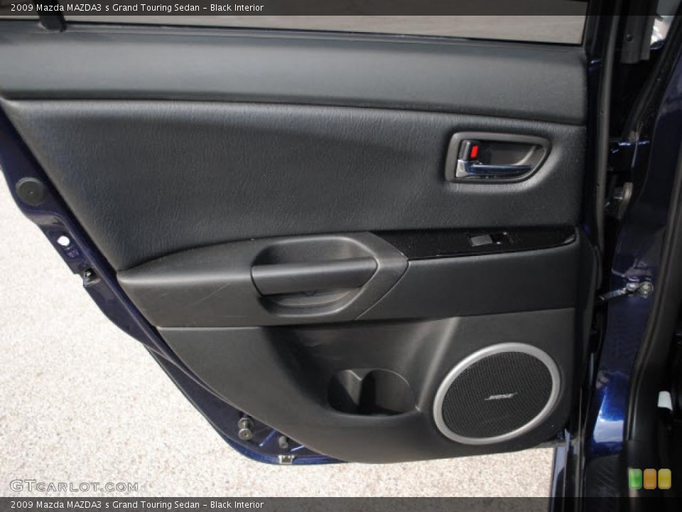 Black Interior Door Panel for the 2009 Mazda MAZDA3 s Grand Touring Sedan #38677694
