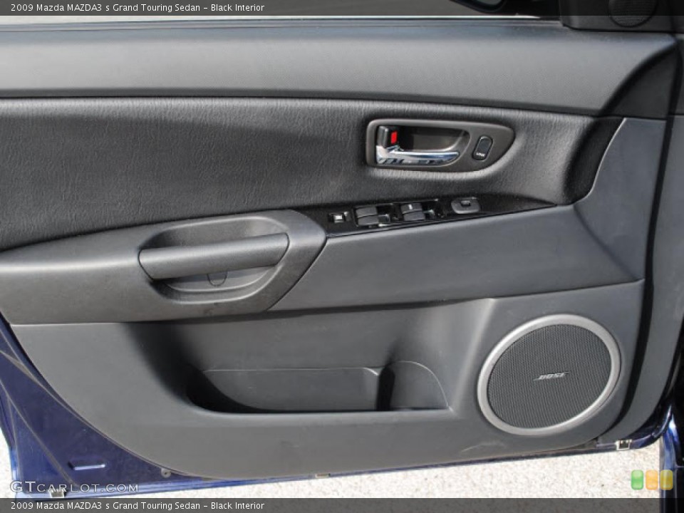 Black Interior Door Panel for the 2009 Mazda MAZDA3 s Grand Touring Sedan #38677750