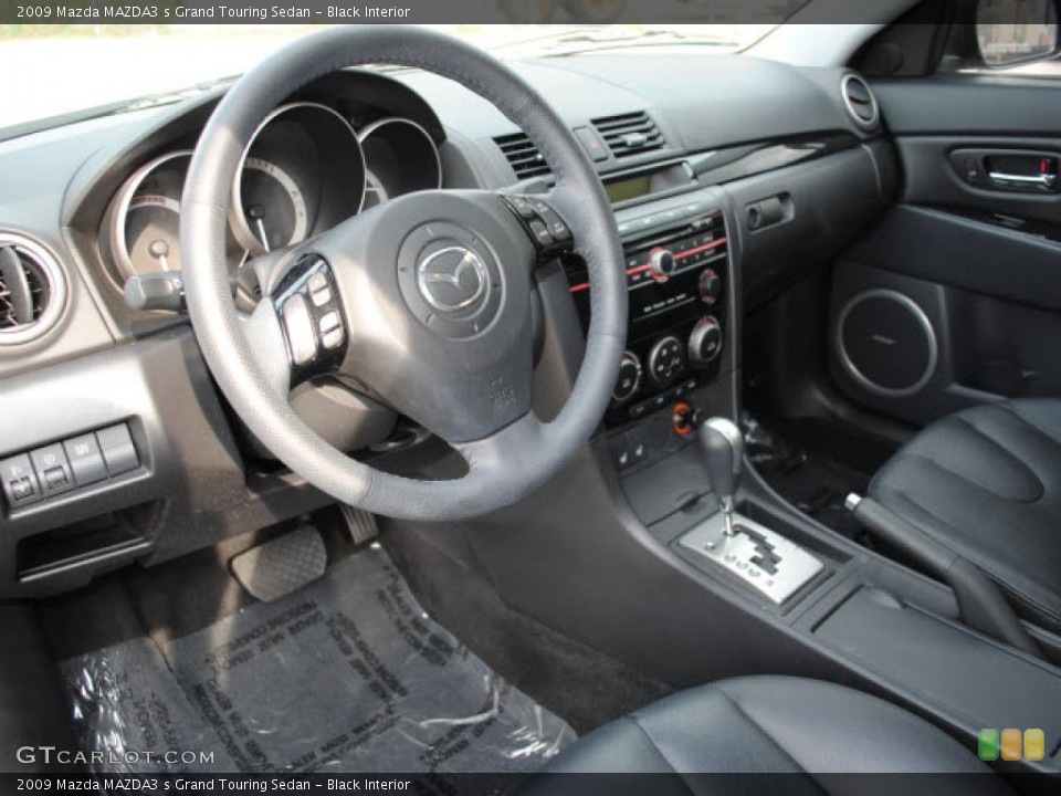 Black Interior Dashboard for the 2009 Mazda MAZDA3 s Grand Touring Sedan #38677766