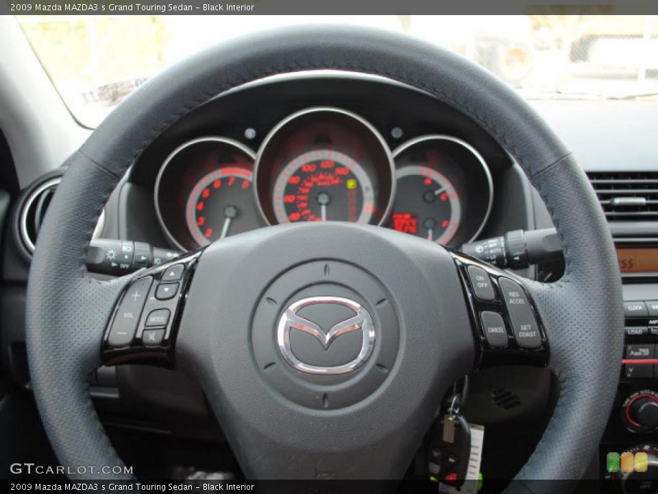 Black Interior Steering Wheel for the 2009 Mazda MAZDA3 s Grand Touring Sedan #38677810