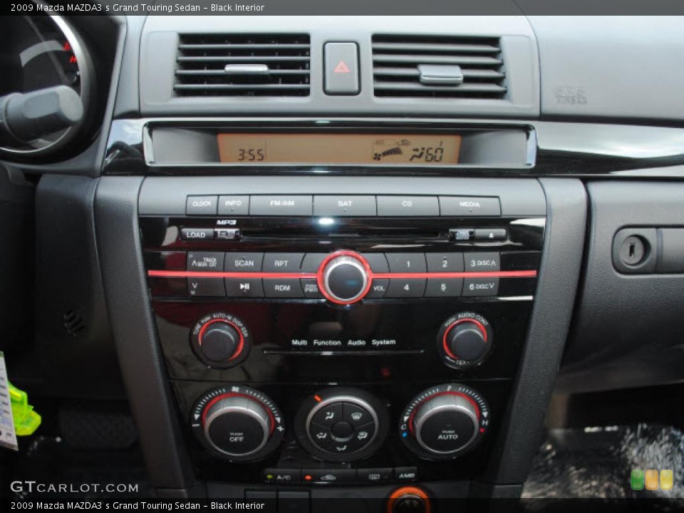 Black Interior Controls for the 2009 Mazda MAZDA3 s Grand Touring Sedan #38677854
