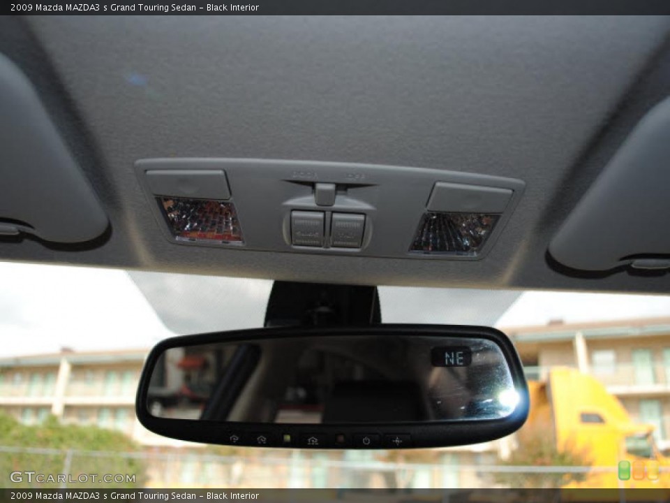 Black Interior Controls for the 2009 Mazda MAZDA3 s Grand Touring Sedan #38677894