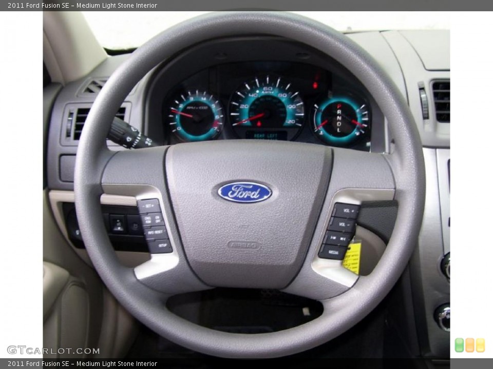Medium Light Stone Interior Steering Wheel for the 2011 Ford Fusion SE #38680386