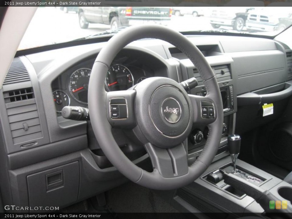 Dark Slate Gray Interior Dashboard for the 2011 Jeep Liberty Sport 4x4 #38692446